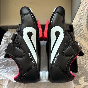 Peloton Black Cycling Shoes with White Logo and Pink Accents